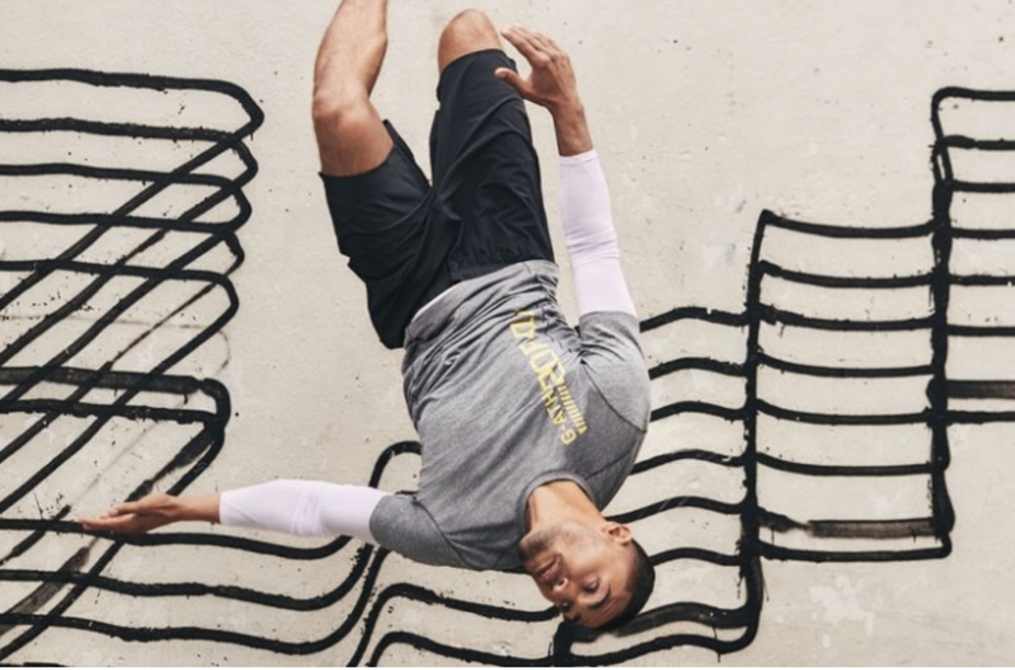 H&M's New Routine sportswear campaign featuring graffiti artist Revok's unauthorised artwork in the background H&M