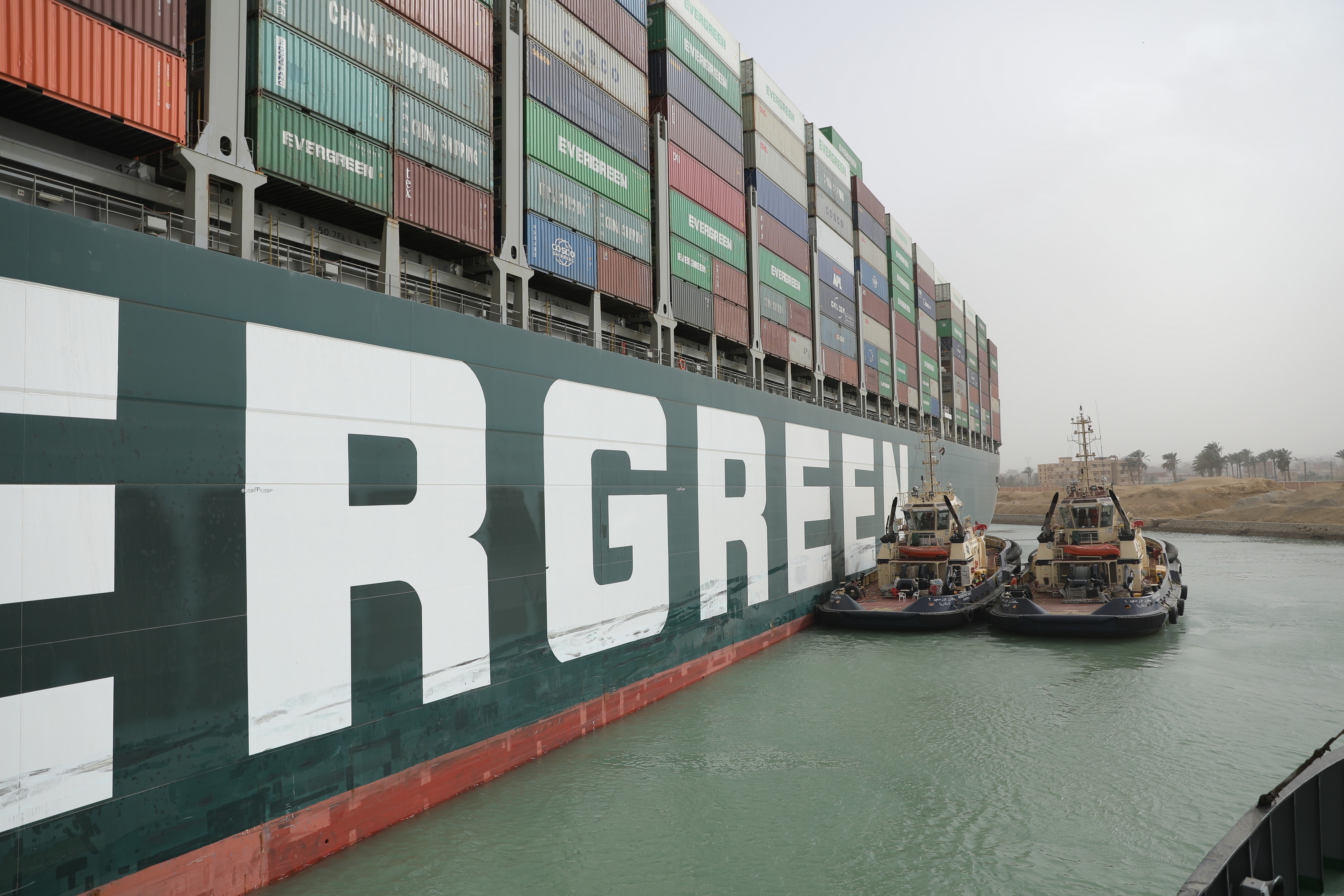 The Ever Given may have grounded after its containers caught high winds in the Suez Canal. Suez Canal Authority