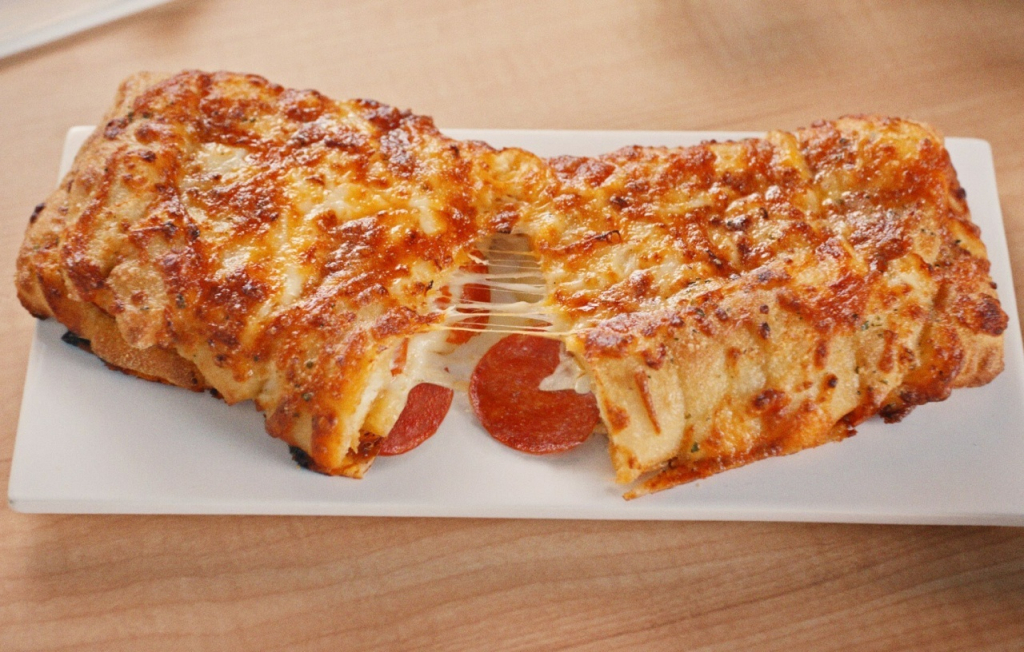 domino-s-debuts-pepperoni-stuffed-cheesy-bread-in-us-outlets-econotimes